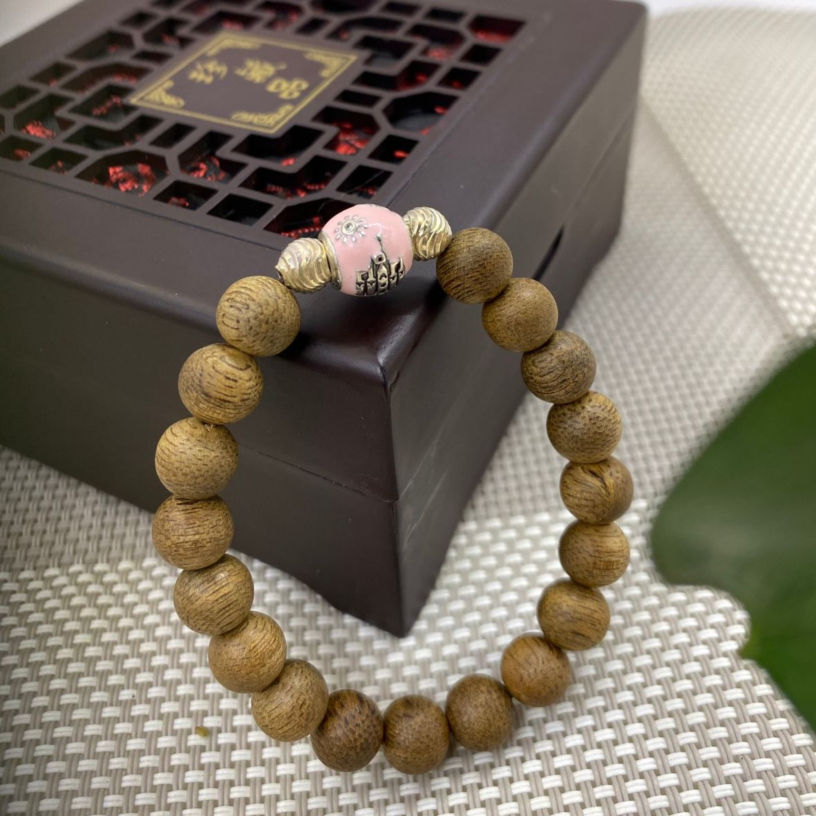 Vòng trầm hương Indo tự nhiên phối charm bạc Ai Cập 